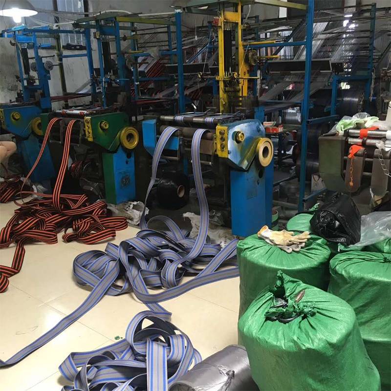 Woven straps and workshop machinery.